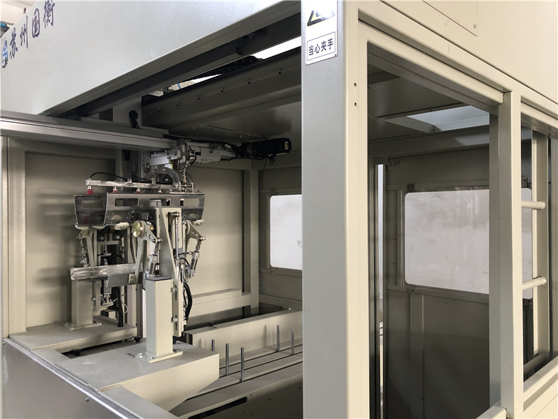 外阀口自动上袋机