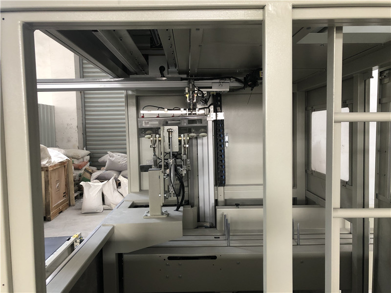 外阀口自动上袋机